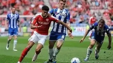 迭戈-莫雷拉：从新手边锋到葡萄牙杰出左后卫的成长之路